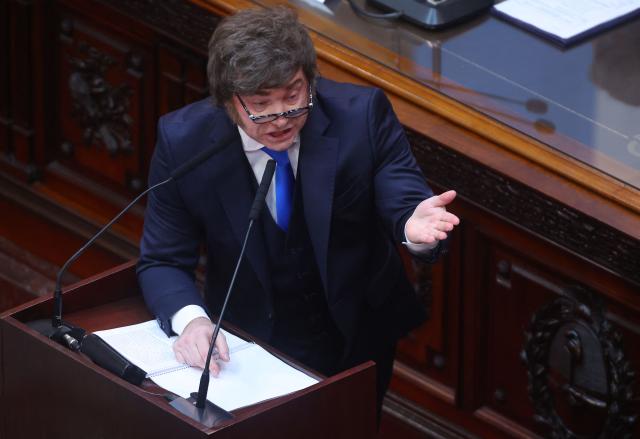 Argentina's President Javier Milei speaks during his annual speech to parliament ahead of the inauguration of the 144th ordinary session of Congress in Buenos Aires on March 1, 2026. (Photo by ALEJANDRO PAGNI / AFP)