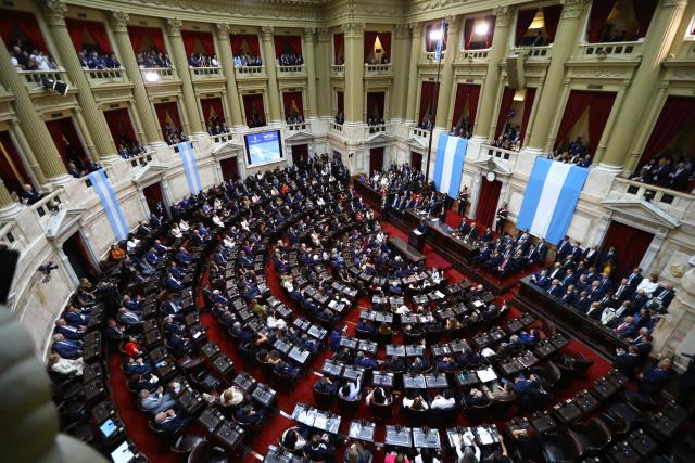 Argentina's President Javier Milei (C) speaks during his annual speech to parliament ahead of the inauguration of the 144th ordinary session of Congress in Buenos Aires on March 1, 2026. (Photo by ALEJANDRO PAGNI / AFP)
