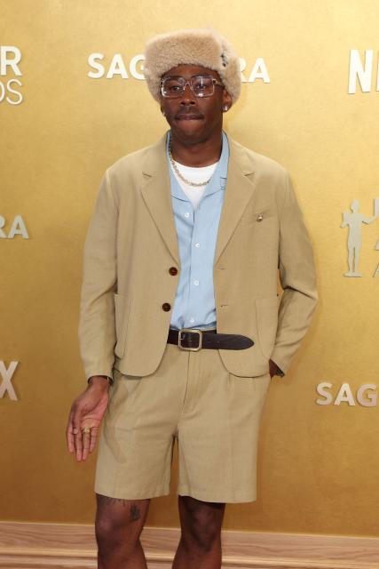 US rapper singer songwriter producer Tyler The Creator attends the 32nd Annual Actor Awards at the Shrine Auditorium in Los Angeles on March 1, 2026. (Photo by Patrick T. Fallon / AFP)
