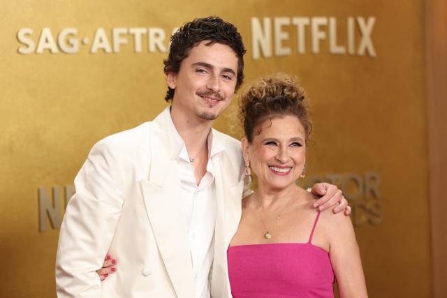 French-US actor Timothee Chalamet and Guest French-US actor Timothee Chalamet and his mother Nicole Flender attend the 32nd Annual Actor Awards at the Shrine Auditorium in Los Angeles on March 1, 2026. (Photo by PATRICK T. FALLON / AFP)