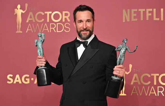 US actor Noah Wyle poses with the awards for Outstanding Performance by a Male Actor in a Drama Series and Outstanding Performance by an Ensemble in a Drama Series for "The Pitt" during the 32nd Annual Actor Awards at the Shrine Auditorium in Los Angeles on March 1, 2026. (Photo by Frederic J. Brown / AFP)