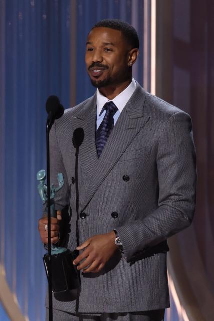US actor Michael B. Jordan accepts the award for Outstanding Performance by a Male Actor in a Leading Role in a Motion Picture for "Sinners" during the 32nd Annual Actor Awards at the Shrine Auditorium in Los Angeles on March 1, 2026. (Photo by VALERIE MACON / AFP)