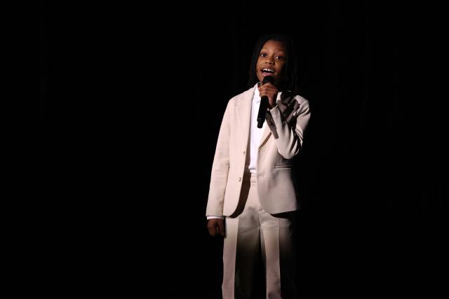 US actor Christopher Sean Cooper Jr. sings onstage during the 32nd Annual Actor Awards at the Shrine Auditorium in Los Angeles on March 1, 2026. (Photo by VALERIE MACON / AFP)