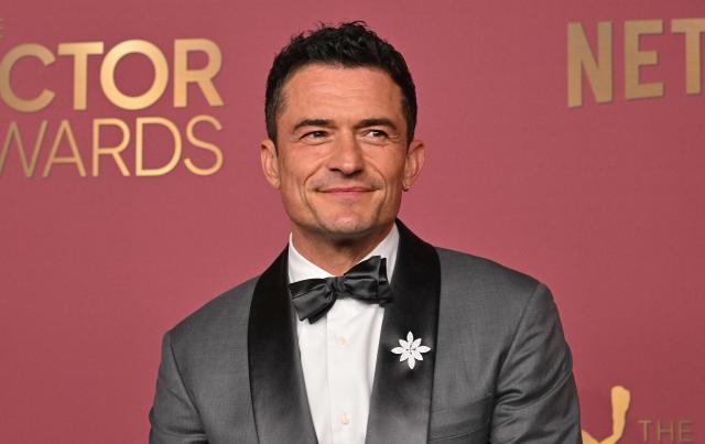 British actor Orlando Bloom poses in the press room during the 32nd Annual Actor Awards at the Shrine Auditorium in Los Angeles on March 1, 2026. (Photo by Frederic J. Brown / AFP)