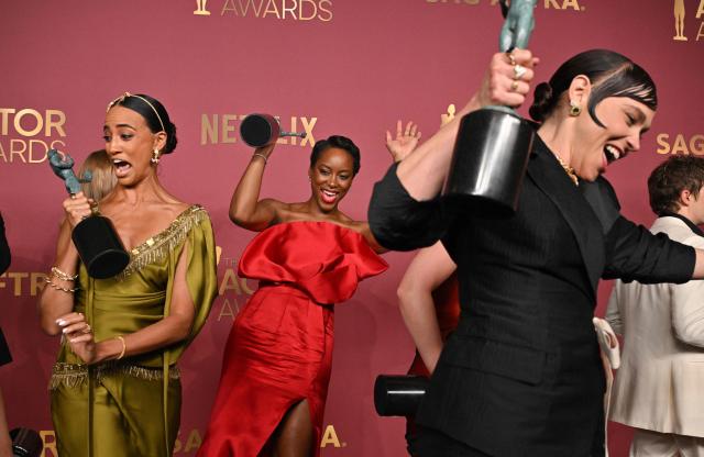US actress Supriya Ganesh (L), British actress Tracy Ifeachor (C) and US actress Fiona Dourif (R) celebrate with the award for Outstanding Performance by an Ensemble in a Drama Series for "The Pitt" during the 32nd Annual Actor Awards at the Shrine Auditorium in Los Angeles on March 1, 2026. (Photo by Frederic J. Brown / AFP)