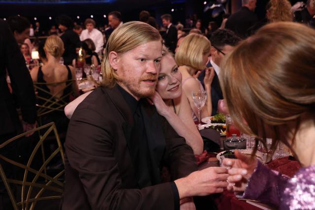US actor Jesse Plemons and US actress Kirsten Dunst chat  during the 32nd Annual Actor Awards at the Shrine Auditorium in Los Angeles on March 1, 2026. (Photo by VALERIE MACON / AFP)