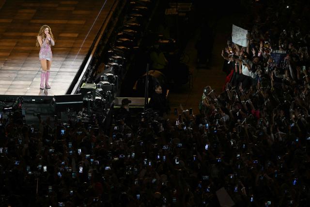 Colombian singer Shakira performs during a free concert at Zocalo square in Mexico City on March 1, 2026. (Photo by Yuri CORTEZ / AFP)