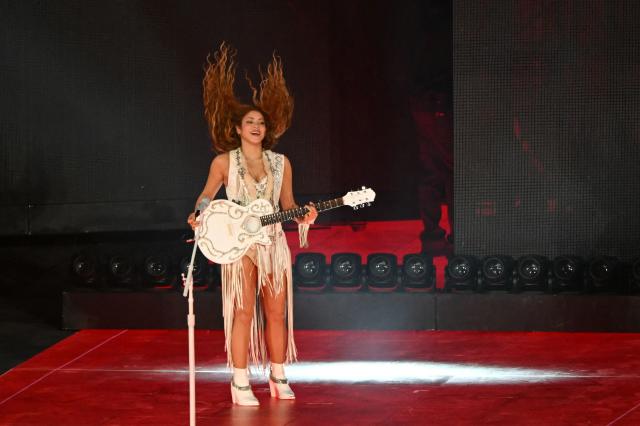 Colombian singer Shakira performs during a free concert at Zocalo square in Mexico City on March 1, 2026. (Photo by Yuri CORTEZ / AFP)