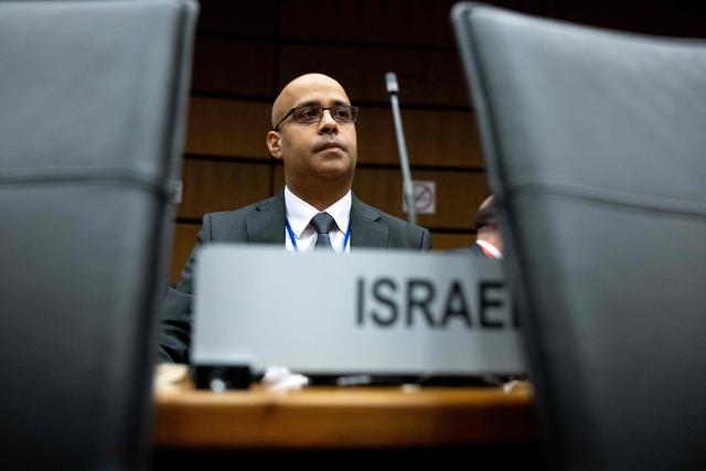 Israel’s representative to the International Atomic Energy Agency (IAEA) Ronen Shaul attends the special meeting on Iran, initiated by Russia, prior to the IAEA’s Board of Governors meeting at the agency's headquarters in Vienna, Austria on March 2, 2026. Delegates at the United Nations' nuclear agency began meeting on Monday for an extraordinary session on Iran in the wake of the US-Israeli strikes on the Islamic republic. Russia, a key ally of Tehran, requested the meeting at the Vienna-based International Atomic Energy Agency (IAEA), following the same request by Iran. The extraordinary meeting precedes an already scheduled regular session of the IAEA's board of governors, which represents 35 countries. (Photo by Joe Klamar / AFP)
