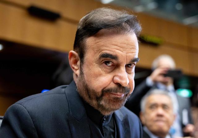 Iran’s ambassador to the International Atomic Energy Agency (IAEA) Reza Najafi attends the special meeting on Iran, initiated by Russia, prior to the IAEA’s Board of Governors meeting at the agency's headquarters in Vienna, Austria on March 2, 2026. Delegates at the United Nations' nuclear agency began meeting on Monday for an extraordinary session on Iran in the wake of the US-Israeli strikes on the Islamic republic. Russia, a key ally of Tehran, requested the meeting at the Vienna-based International Atomic Energy Agency (IAEA), following the same request by Iran. The extraordinary meeting precedes an already scheduled regular session of the IAEA's board of governors, which represents 35 countries. (Photo by Joe Klamar / AFP)