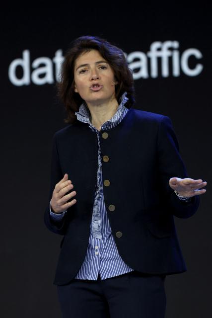 Orange's CEO Chrystel Heydemann speaks on stage during the Mobile World Congress (MWC), the world's biggest mobile technology showcase and fair, on March 2, 2026 in Barcelona. The Mobile World Congress (MWC), the major annual telecommunications event, opens today in Barcelona for an edition where Artificial Intelligence in telecommunications will take center stage in the debates. The event, which marking its twentieth anniversary, will host the world's leading telecommunications operators and numerous manufacturers. 109,000 industry professionals and visitors are expected. (Photo by Lluis GENE / AFP)