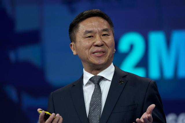 China Telecom President Liu Guiqing speaks on stage during the Mobile World Congress (MWC), the world's biggest mobile technology showcase and fair, on March 2, 2026 in Barcelona. The Mobile World Congress (MWC), the major annual telecommunications event, opens today in Barcelona for an edition where Artificial Intelligence in telecommunications will take center stage in the debates. The event, which marking its twentieth anniversary, will host the world's leading telecommunications operators and numerous manufacturers. 109,000 industry professionals and visitors are expected. (Photo by Lluis GENE / AFP)