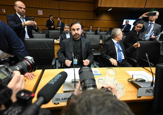 Iran’s ambassador to the International Atomic Energy Agency (IAEA) Reza Najafi attends the special meeting on Iran, initiated by Russia, prior to the IAEA’s Board of Governors meeting at the agency's headquarters in Vienna, Austria on March 2, 2026. Delegates at the United Nations' nuclear agency began meeting on Monday for an extraordinary session on Iran in the wake of the US-Israeli strikes on the Islamic republic. Russia, a key ally of Tehran, requested the meeting at the Vienna-based International Atomic Energy Agency (IAEA), following the same request by Iran. The extraordinary meeting precedes an already scheduled regular session of the IAEA's board of governors, which represents 35 countries. (Photo by HELMUT FOHRINGER / APA / AFP) / Austria OUT