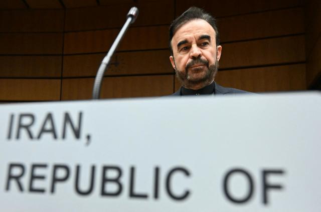 Iran’s ambassador to the International Atomic Energy Agency (IAEA) Reza Najafi attends the special meeting on Iran, initiated by Russia, prior to the IAEA’s Board of Governors meeting at the agency's headquarters in Vienna, Austria on March 2, 2026. Delegates at the United Nations' nuclear agency began meeting on Monday for an extraordinary session on Iran in the wake of the US-Israeli strikes on the Islamic republic. Russia, a key ally of Tehran, requested the meeting at the Vienna-based International Atomic Energy Agency (IAEA), following the same request by Iran. The extraordinary meeting precedes an already scheduled regular session of the IAEA's board of governors, which represents 35 countries. (Photo by HELMUT FOHRINGER / APA / AFP) / Austria OUT