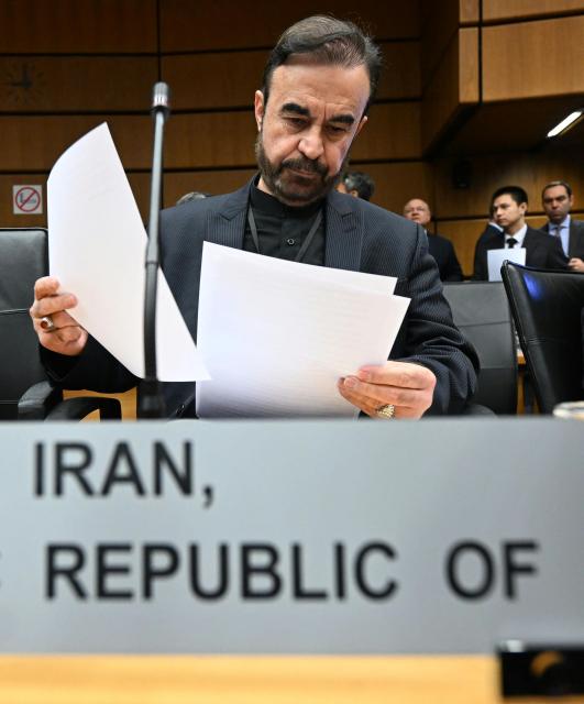 Iran’s ambassador to the International Atomic Energy Agency (IAEA) Reza Najafi attends the special meeting on Iran, initiated by Russia, prior to the IAEA’s Board of Governors meeting at the agency's headquarters in Vienna, Austria on March 2, 2026. Delegates at the United Nations' nuclear agency began meeting on Monday for an extraordinary session on Iran in the wake of the US-Israeli strikes on the Islamic republic. Russia, a key ally of Tehran, requested the meeting at the Vienna-based International Atomic Energy Agency (IAEA), following the same request by Iran. The extraordinary meeting precedes an already scheduled regular session of the IAEA's board of governors, which represents 35 countries. (Photo by HELMUT FOHRINGER / APA / AFP) / Austria OUT