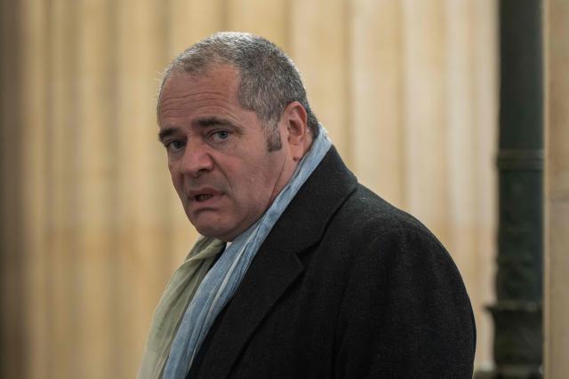 François Thierry, former chief of the French anti-narcotics office (Ocrtis), waits to enter the courtroom for the opening of his trial on charges of complicity in drug trafficking alongside 17 co-defendants, at the courthouse in Bordeaux, south-western France, on March 2, 2026. (Photo by Philippe LOPEZ / AFP)