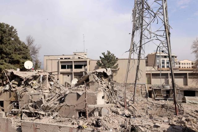 A view of the destroyed state TV communications tower, next to Gandi Hospital, which was hit March 1, when a projectile struck during the ongoing joint US-Israeli military campaign on the capital Tehran on March 2, 2026. The United States and Israel launched strikes against Iran on February 28, killing Iran's supreme leader and top military leaders, prompting authorities to retaliate with strikes on Israel and across the Gulf. (Photo by ATTA KENARE / AFP)