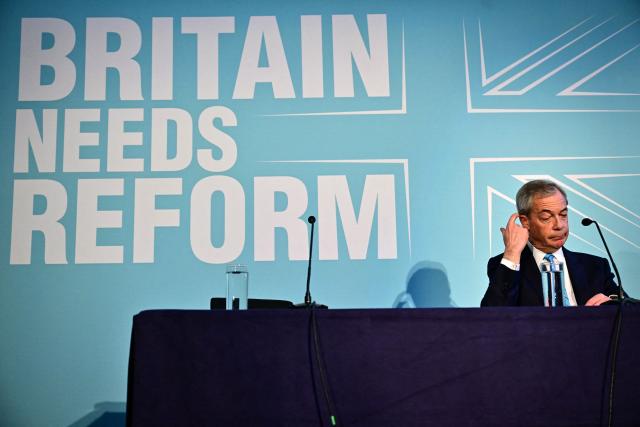 Reform UK leader Nigel Farage listens as Reform's Treasury spokesperson Robert Jenrick (unseen) speaks during a party press conference in central London on March 2, 2026. (Photo by Ben STANSALL / AFP)