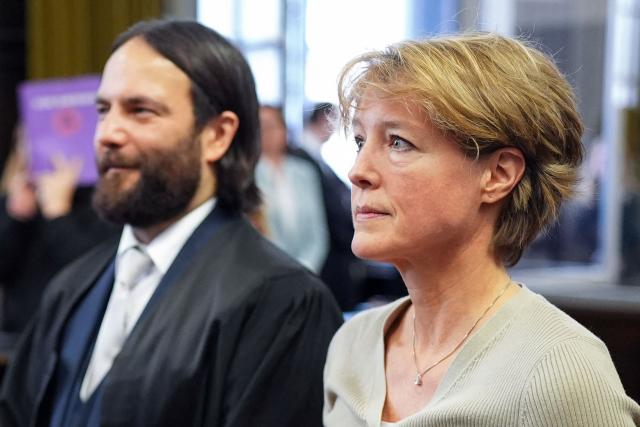 Defendant German entrepreneur and gastronome Christina Block (R) is seen next to her lawyer Ingo Bott as she waits for the continuation of her trial over alleged child abduction at the District Court in Hamburg, northern Germany, on March 2, 2026. The public prosecutor's office accuses Block, heiress of a steakhouse chain, of ordering the abduction of her daughter, born in 2010, and her son, born in 2013. According to the indictment, the background to this is an escalating custody dispute over many years between Block and her former husband, who have four children together. (Photo by Marcus Brandt / POOL / AFP)