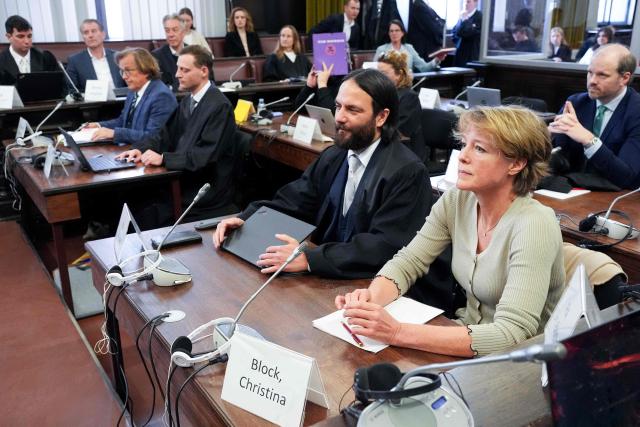Defendant German entrepreneur and gastronome Christina Block (R) sits next to her lawyer Ingo Bott as she waits for the continuation of her trial over alleged child abduction at the District Court in Hamburg, northern Germany, on March 2, 2026. The public prosecutor's office accuses Block, heiress of a steakhouse chain, of ordering the abduction of her daughter, born in 2010, and her son, born in 2013. According to the indictment, the background to this is an escalating custody dispute over many years between Block and her former husband, who have four children together. (Photo by Marcus Brandt / POOL / AFP)