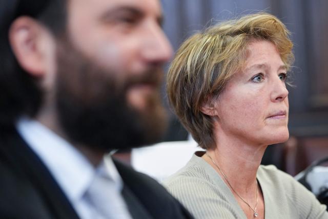 Defendant German entrepreneur and gastronome Christina Block (R) sits next to her lawyer Ingo Bott as she waits for the continuation of her trial over alleged child abduction at the District Court in Hamburg, northern Germany, on March 2, 2026. The public prosecutor's office accuses Block, heiress of a steakhouse chain, of ordering the abduction of her daughter, born in 2010, and her son, born in 2013. According to the indictment, the background to this is an escalating custody dispute over many years between Block and her former husband, who have four children together. (Photo by Marcus Brandt / POOL / AFP)