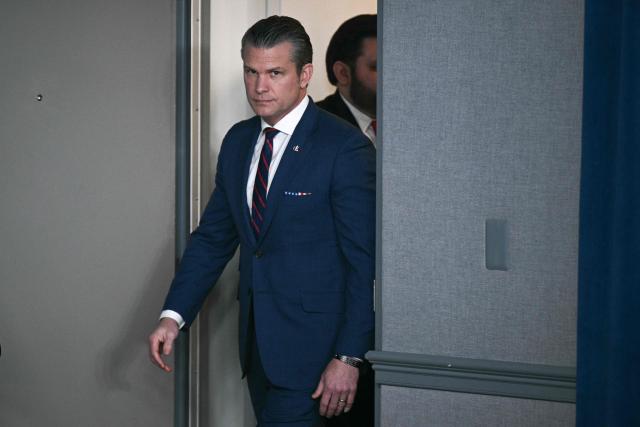 US Defense Secretary Pete Hegseth arrives for a press conference on US military action in Iran, at the Pentagon in Washington, DC, on March 2, 2026. The United States hit hundreds of targets across Iran, and Israel expanded its bombing to Lebanon on Monday as President Donald Trump vowed to avenge the first US deaths in the war he launched to topple Tehran's ruling clerics. Iranian forces fired missiles and drones across the Middle East, killing people in Israel and the United Arab Emirates, in retaliation for the conflict that began February 28 with the death of Iran's supreme leader, Ayatollah Ali Khamenei. (Photo by Brendan SMIALOWSKI / AFP)