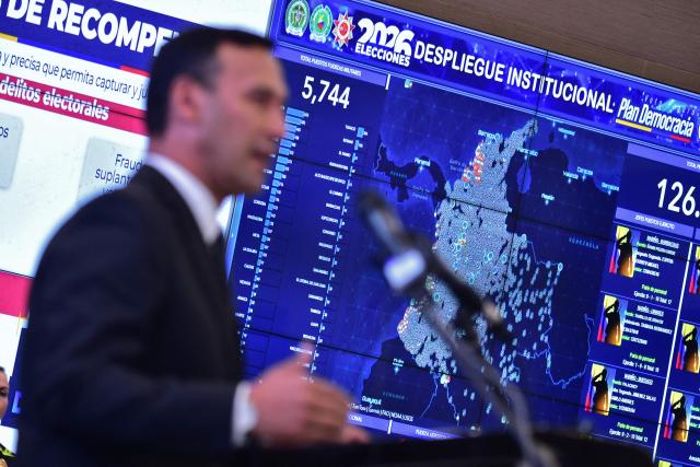 Colombia's Defense Minister, Pedro Arnulfo Sanchez, speaks during a press conference to inform about the security measures to be implemented for the next legislative and presidential elections at the National Police headquarters in Bogota on March 2, 2026. Colombia will hold legislative elections on March 8 and presidential elections on May 31. (Photo by Pablo VERA / AFP)