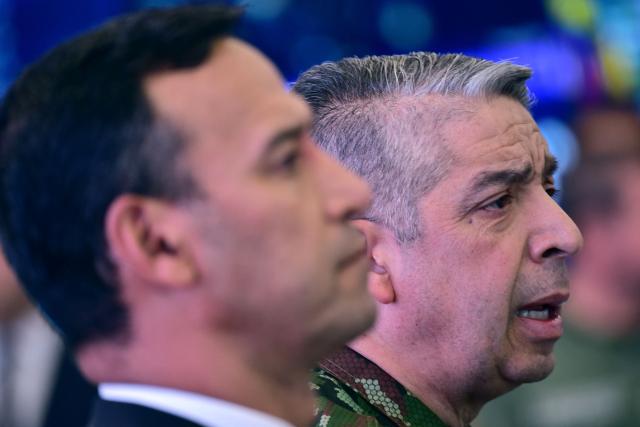 Commander-in-Chief of the Colombian Armed Forces, Hugo Lopez Barreto (R), speaks next to Defense Minister, Pedro Arnulfo Sanchez, during a press conference to inform about the security measures to be implemented for the next legislative and presidential elections at the National Police headquarters in Bogota on March 2, 2026. Colombia will hold legislative elections on March 8 and presidential elections on May 31. (Photo by Pablo VERA / AFP)