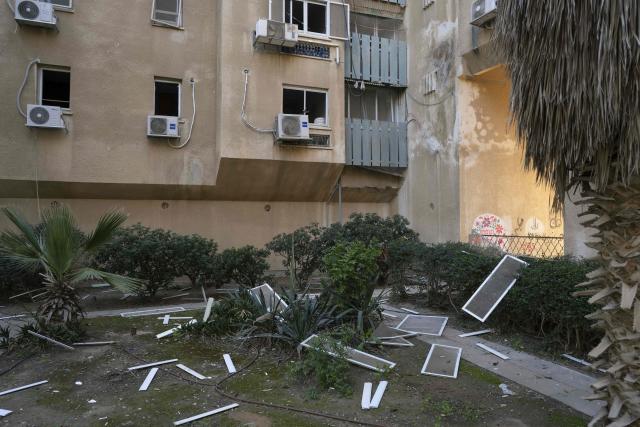 A photograoh shows the damage at the scene of an Iranian missile strike in Beersheva on March 2, 2026. The United States and Israel launched strikes against Iran on February 28, killing Iran's supreme leader and top military leaders, prompting authorities to retaliate with strikes on Israel and across the Gulf. (Photo by Maya Levin / AFP)