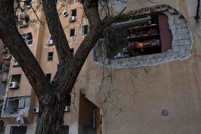 A photograoh shows the damage at the scene of an Iranian missile strike in Beersheva on March 2, 2026. The United States and Israel launched strikes against Iran on February 28, killing Iran's supreme leader and top military leaders, prompting authorities to retaliate with strikes on Israel and across the Gulf. (Photo by Maya Levin / AFP)