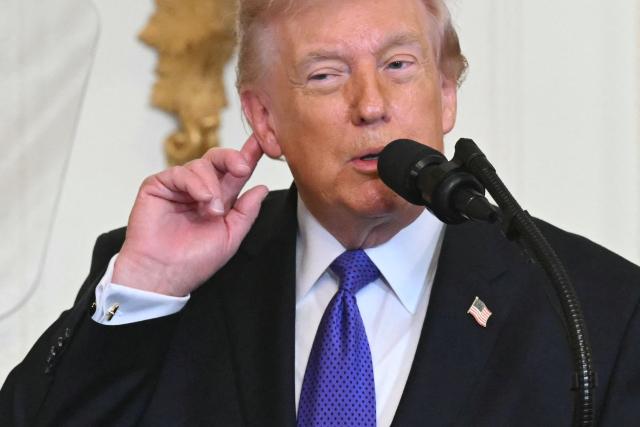 US President Donald Trump speaks during a Medal of Honor ceremony in the East Room of the White House on March 2, 2026, in Washington, DC. President Trump awarded the Medal of Honor to retired Army Command Sgt. Major Terry P. Richardson, who served in the Vietnam War, posthumously to Army Master Sgt. Roderick W. Edmonds, who served in World War II, and posthumously to Staff Sgt. Michael Ollis, who died in combat in Afghanistan in 2013. (Photo by SAUL LOEB / AFP)