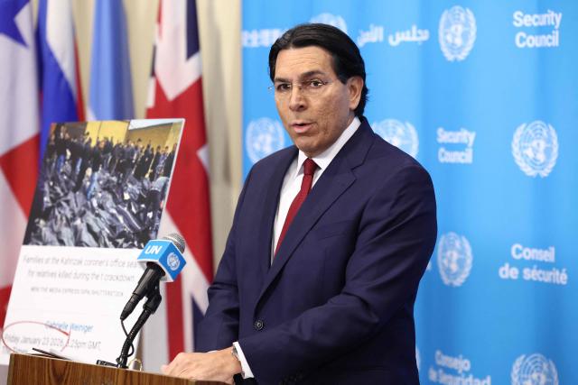 Israeli Ambassador to the UN Danny Danon speaks to the press ahead of a United Nations Security Council meeting at UN Headquarters in New York on March 2, 2026. UN Secretary-General Antonio Guterres called Monday for restraint as clashes between Israel and Hezbollah in Lebanon intensified amid the Israeli and US war on the armed group's main backer Iran, his spokesman said. (Photo by CHARLY TRIBALLEAU / AFP)