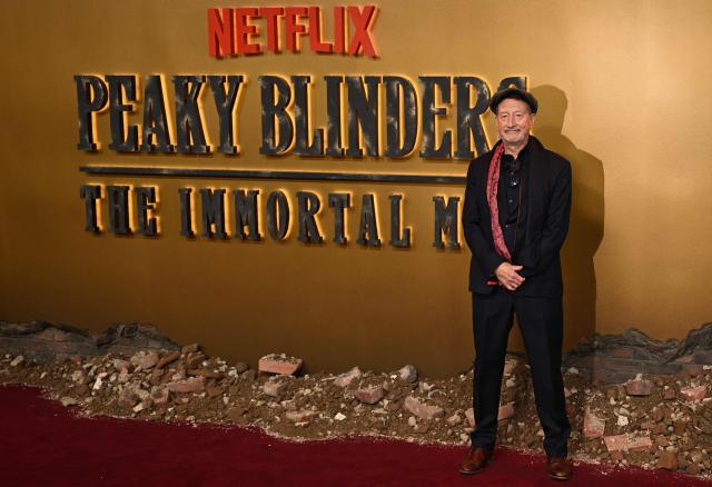 British screenwriter Steven Knight poses upon arrival on the red carpet for the global premiere of the film 'Peaky Blinders: The Immortal Man' in Birmingham, central England on March 2, 2026. (Photo by Paul ELLIS / AFP)