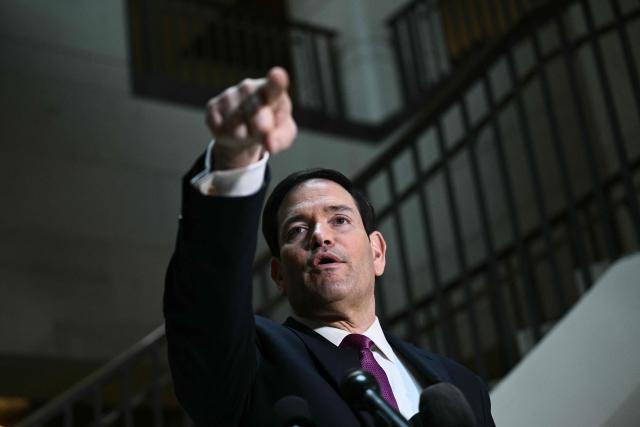 US Secretary of State Marco Rubio arrives to brief House and Senate leaders on US military action in Iran, at the US Capitol in Washington, DC, on March 2, 2026. The United States hit hundreds of targets across Iran, and Israel expanded its bombing to Lebanon on Monday as President Donald Trump vowed to avenge the first US deaths in the war he launched to topple Tehran's ruling clerics. Iranian forces fired missiles and drones across the Middle East, killing people in Israel and the United Arab Emirates, in retaliation for the conflict that began February 28 with the death of Iran's supreme leader, Ayatollah Ali Khamenei. (Photo by Brendan SMIALOWSKI / AFP)