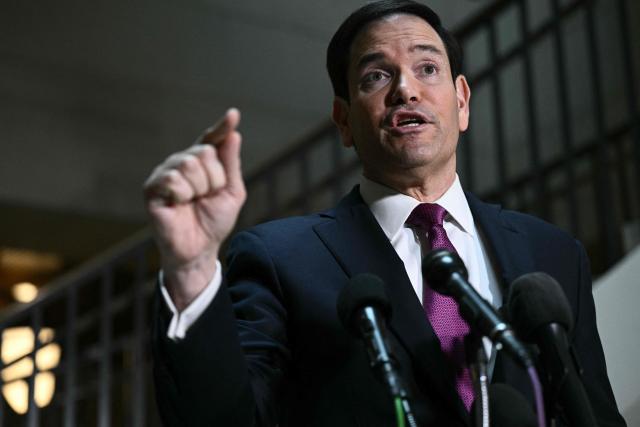 US Secretary of State Marco Rubio arrives to brief House and Senate leaders on US military action in Iran, at the US Capitol in Washington, DC, on March 2, 2026. The United States hit hundreds of targets across Iran, and Israel expanded its bombing to Lebanon on Monday as President Donald Trump vowed to avenge the first US deaths in the war he launched to topple Tehran's ruling clerics. Iranian forces fired missiles and drones across the Middle East, killing people in Israel and the United Arab Emirates, in retaliation for the conflict that began February 28 with the death of Iran's supreme leader, Ayatollah Ali Khamenei. (Photo by Brendan SMIALOWSKI / AFP)