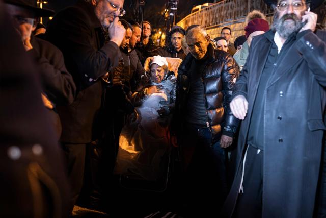 Mourners react during a funeral of Yaakov Biton, 16, and his two sisters Avigail, 15, and Sarah, 13, who were killed the previous day in an Iranian attack, at a cemetery on the Mount of Olives in Jerusalem on March 2, 2026. The United States and Israel launched strikes against Iran on February 28, killing Iran's supreme leader and top military leaders, prompting authorities to retaliate with strikes on Israel and across the Gulf. (Photo by JOHN WESSELS / AFP)