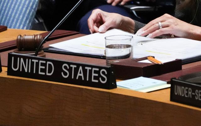 US First Lady Melania Trump flips though an agenda as she chairs a meeting of the United Nations Security Council at UN Headquarters in New York on March 2, 2026. (Photo by TIMOTHY A. CLARY / AFP)
