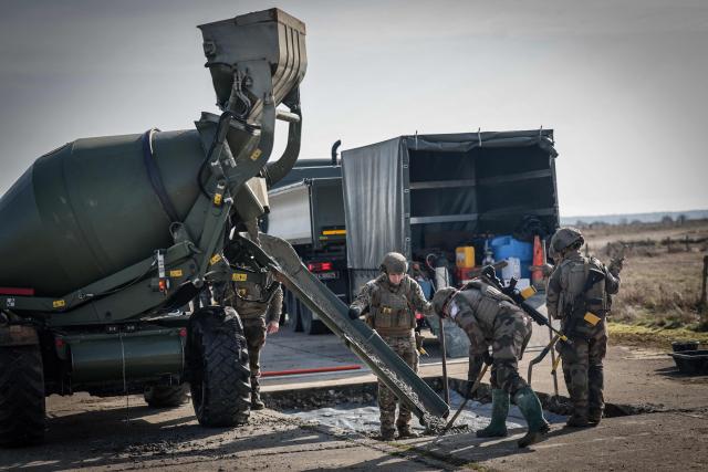 French soldiers repair a runway as part of the drill named Orion in Crucey military base, next to Dreux, on February 26, 2026. (Photo by STEPHANE DE SAKUTIN / AFP)