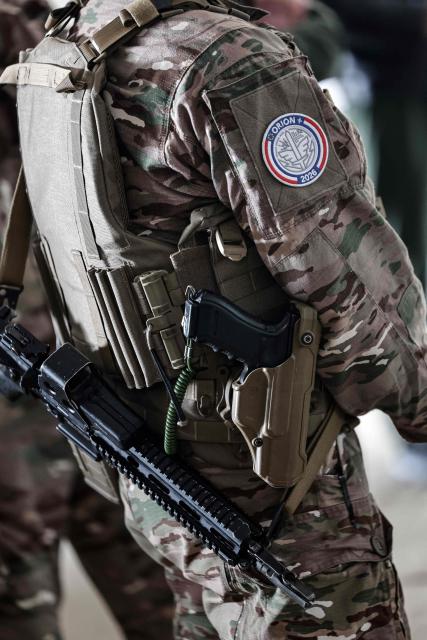 A French soldier takes part in the drill named Orion in Crucey military base, next to Dreux, on February 26, 2026. (Photo by STEPHANE DE SAKUTIN / AFP)