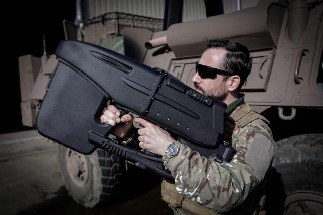 A French soldier manipulates a portable electronic warfare anti-drone device during the drill named Orion in Crucey military base, next to Dreux, on February 26, 2026. (Photo by STEPHANE DE SAKUTIN / AFP)