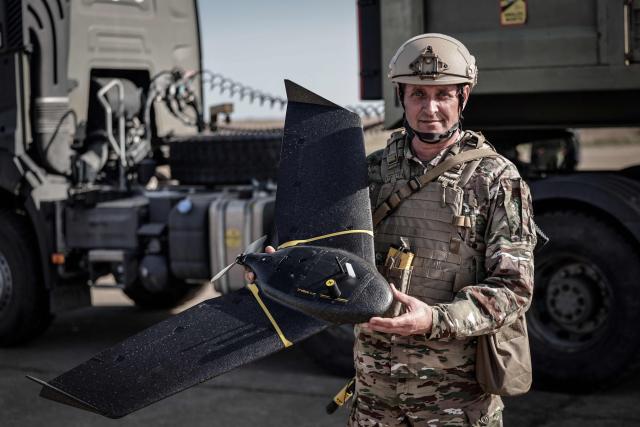 A French soldier holds a military drone during the drill named Orion in Crucey military base, next to Dreux, on February 26, 2026. (Photo by STEPHANE DE SAKUTIN / AFP)