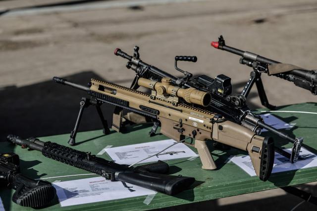 This photograph shows military weapons displayed during the drill named Orion in Crucey military base, next to Dreux, on February 26, 2026. (Photo by STEPHANE DE SAKUTIN / AFP)