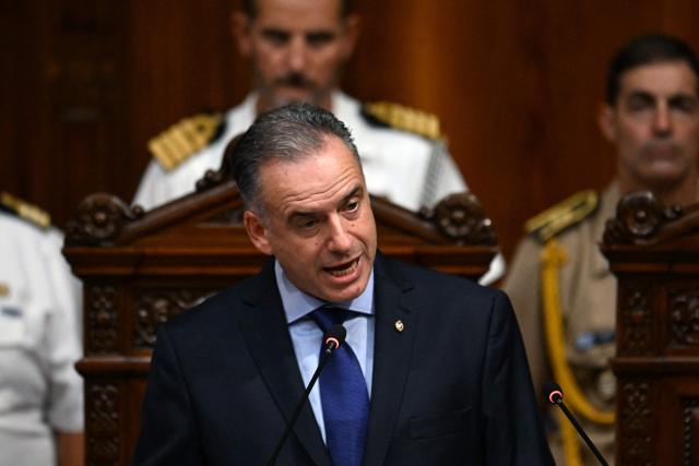 Uruguay's President Yamandu Orsi delivers a speech before the General Assembly at the Legislative Palace in Montevideo on March 2, 2026, marking his first year in office. (Photo by EITAN ABRAMOVICH / AFP)