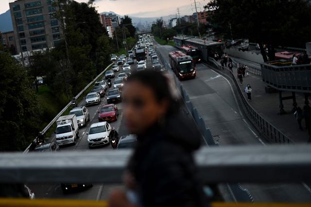 Vehicles line up in heavy traffic during a jam in Bogota on March 2, 2026. (Photo by Pablo VERA / AFP)
