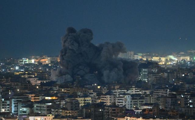 Black smoke rises from the site of an Israeli airstrike that targeted the office of the Hezbollah affiliated Al-Manar TV station in Beirut’s southern suburb of Haret Hreik on March 3, 2026. An Israeli strike hit the south Beirut office of Al-Manar TV, which is affiliated with Iran-backed militant group Hezbollah, the broadcaster said on March 3. Israel "targets the Al-Manar Channel building in the Haret Hreik area," Al-Manar wrote on Telegram, referring to a part of south Beirut. (Photo by FADEL itani / AFP)