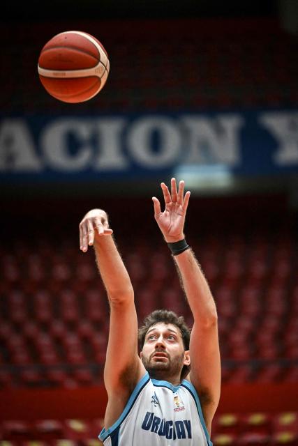 Uruguay's Emiliano Serres takes a shot during the FIBA Basketball World Cup 2027 Americas qualifiers Group D match between Cuba and Uruguay at Roberto Duran arena in Panama City on March 2, 2026. (Photo by MARTIN BERNETTI / AFP)