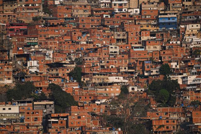 The Petare neighborhood is pictured in Caracas on March 2, 2026. (Photo by Federico PARRA / AFP)