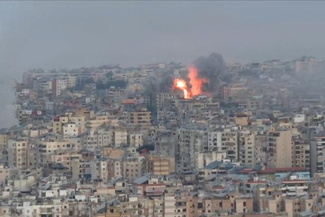 This frame grab from AFPTV video footage taken on March 3, 2026 shows smoke rising into the air after Israeli strikes hit the outskirts of Beirut. The Israeli military issued new evacuation orders for dozens of locations in Lebanon on March 3, including warning residents in two southern Beirut neighbourhoods to stay away from several buildings ahead of an imminent operation. (Photo by Kamal MEHANNA / AFPTV / AFP)