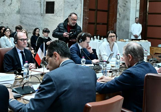 France's junior Minister for industry Sebastien Martin (L) listens to the Minister of Enterprises and Made in Italy Adolfo Urso (R) during a meeting at the Ministry of Enterprises and Made in Italy in Rome on March 3, 2026. (Photo by Filippo MONTEFORTE / AFP)