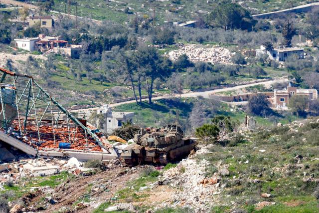 An Israeli army Merkava Mark IV main battle tank deploys at a position along the border between northern Israel and southern Lebanon on March 3, 2026. Israel on March 3 ordered the military to take control of more positions in Lebanon, where the army pulled back some of its forces after Hezbollah attacked Israeli bases in support of its backer, Iran. (Photo by Jalaa MAREY / AFP)